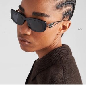 Brand new Prada Symbole Sunglasses with both Box and case.